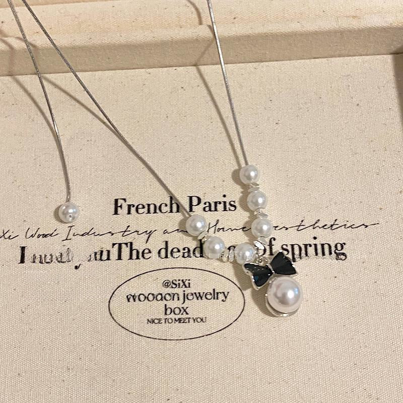 Bow design pearl necklace