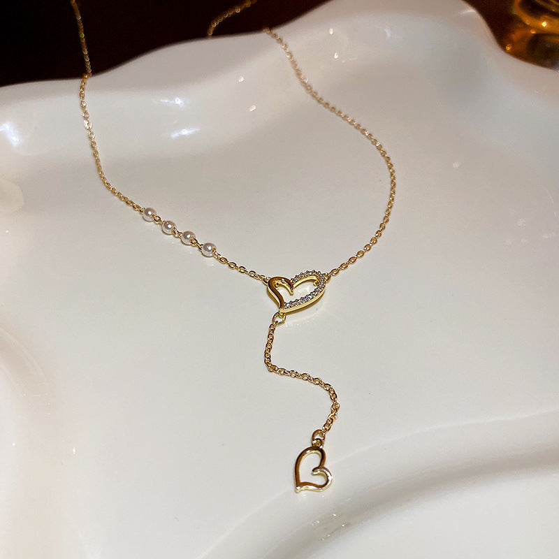 Hollow peach heart pearl necklace