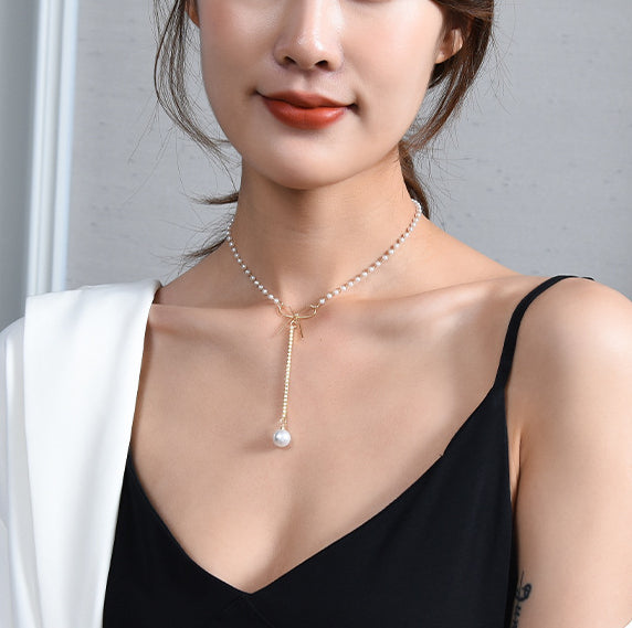 Bow design pearl necklace