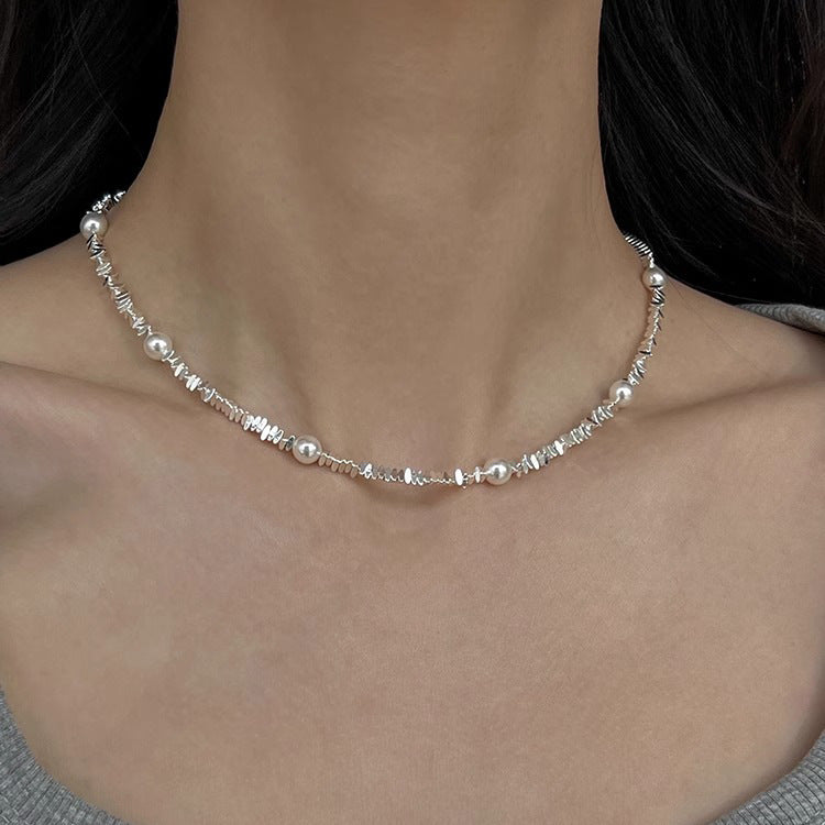 Pearl broken silver gypsy star design necklace
