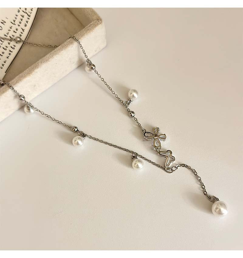 Hollow butterfly design pearl necklace