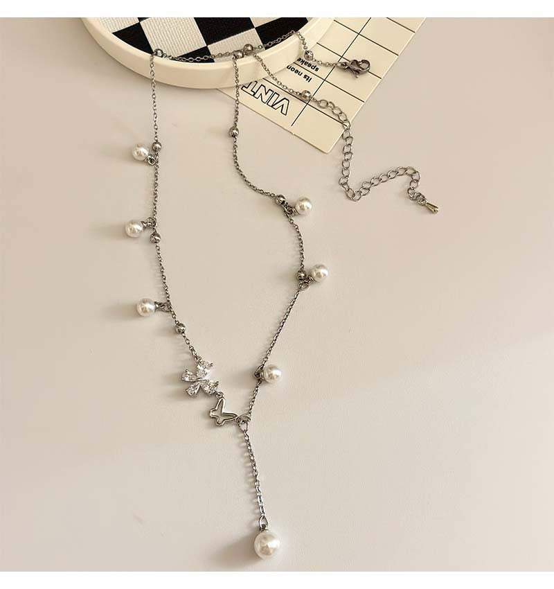Hollow butterfly design pearl necklace