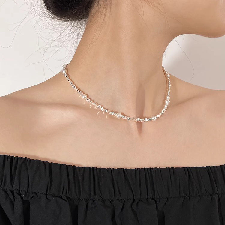 Pearl broken silver gypsy star design necklace