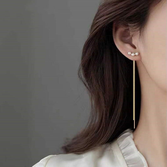 A two-wear fringed pearl earring