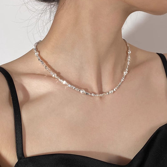 Pearl broken silver gypsy star design necklace