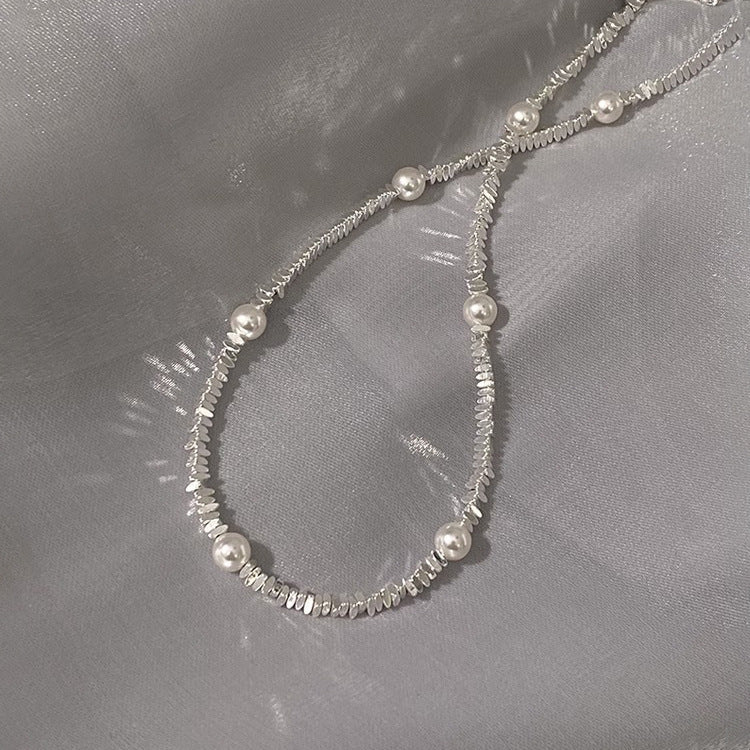 Pearl broken silver gypsy star design necklace