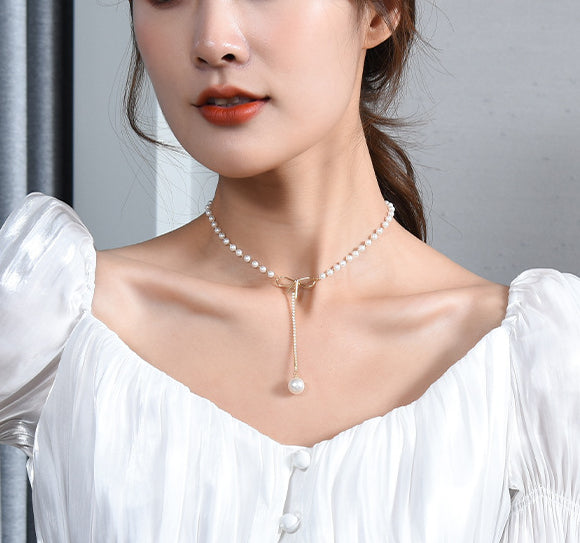 Bow design pearl necklace